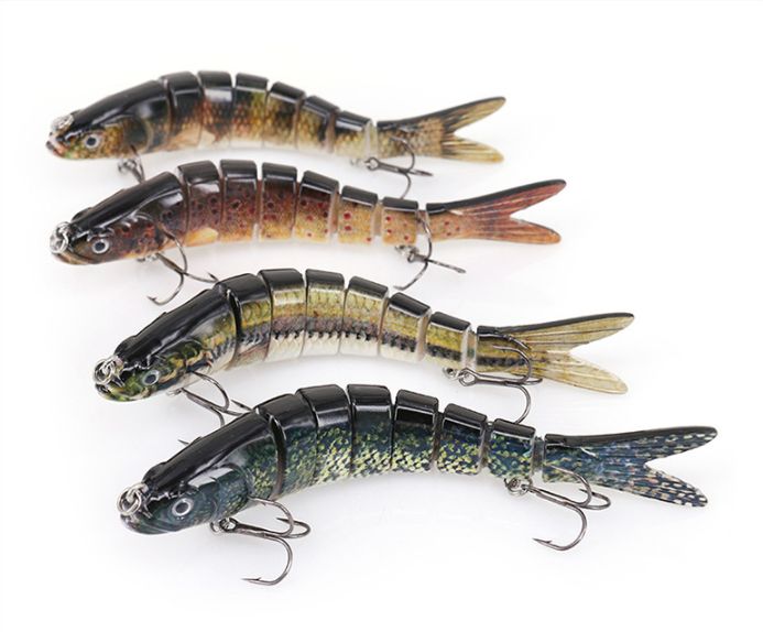 Four 8-segment jointed lures in brown and green patterns